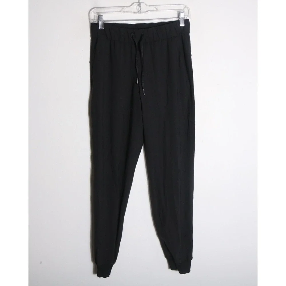 Lululemon On‎ The Fly Jogger Womens 4 Black Luxtreme Pull On Ankle Workout